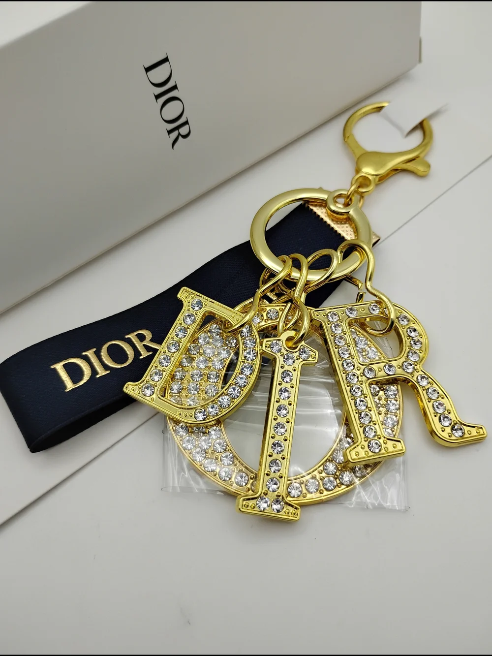 Dior Gold Crystal 'D I O R' Logo Keychain with Black Ribbon BNIB